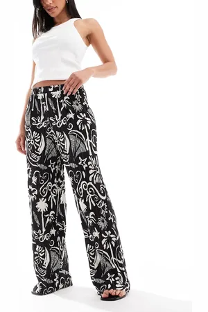VERO MODA High waist wide leg plisse trouser in tropical conversational print