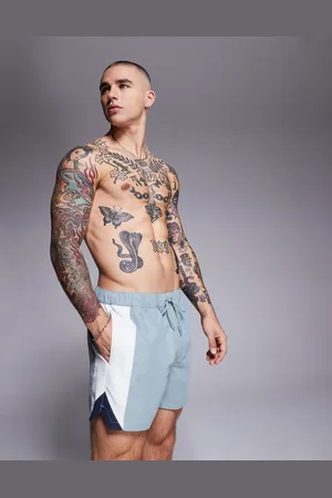 ASOS Swim shorts in short length with side vent cut and sew in
