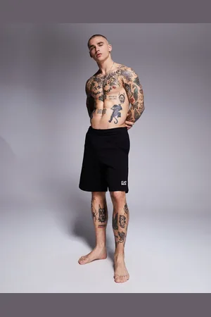 EA7 Armani logo jogger shorts in navy