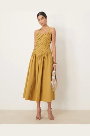 ASOS Halter neck asymmetric pleat bodice midi dress with dropped waist in turmeric