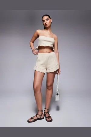 ASOS Co-ord crinkle flippy shorts with frill hem in stone