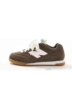 New Balance RC42 trainers in and pink with gumsole