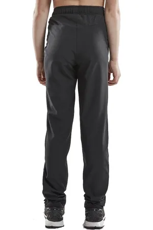 Craft Rush Wind Pants kinderen - 122/128 - Sportbroeken - zwart - Unisex