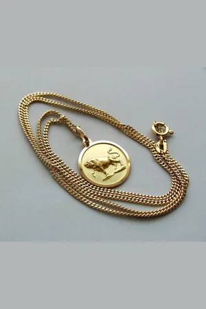 Christian Gouden collier met stier hanger