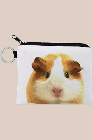 Merkloos Gemakkelijk om erbij te hebben, dit handige rits portemonneetje met sleutelring 12x10cm en een leuke afbeelding van een cavia / konijn. Erg leuk om voor jezelf te kopen of om cadeau te geven aan iemand.