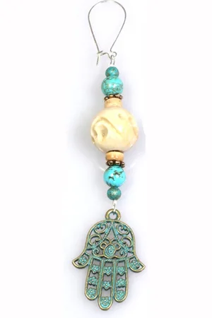 Heaven Eleven Dames - oorbel -turquoisekleurige metalen gelukshandje