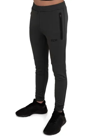 TCA Jongens Rapid Quickdry Tapered Tech Training Track Pants met ritszakken - Zwart Stealth, 10-12 jaar