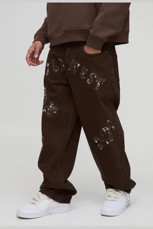 Boohoo Baggy Koeienprint Jeans Met Kruis