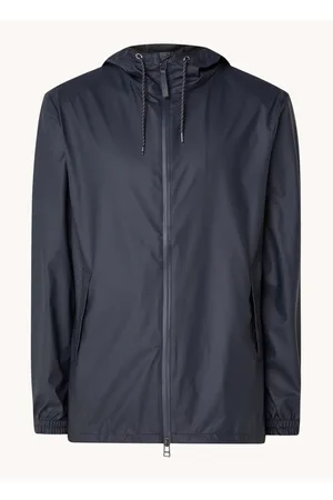 Rains Storm Breaker regenjas met capuchon en steekzakken