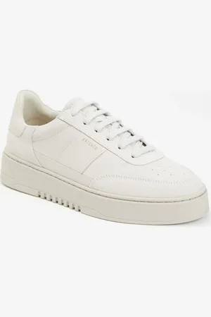 Axel Arigato Orbit sneaker van suède met details van leer