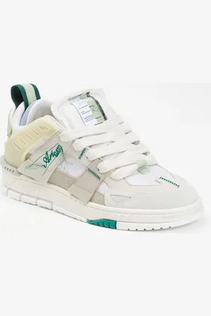 Axel Arigato Area Patchwork sneaker met details van suède en nubuck