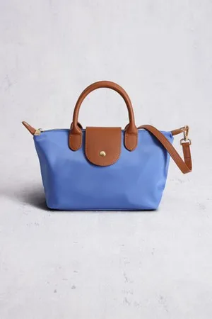 Liberty Island Blauwe handtas met bruine leather look afwerking
