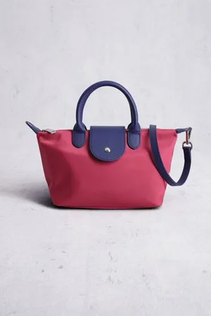 Liberty Island Roze handtas met paarse leather look afwerking