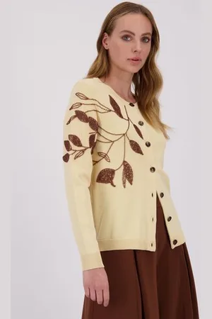 D Auvry Lichtbeige cardigan met parelknopen