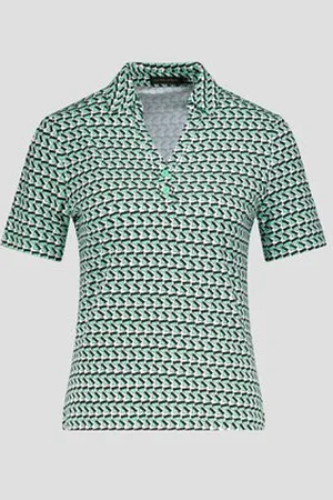 Claude Arielle Witte polo met groene driehoekprint
