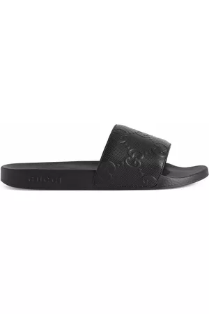 Gucci GG-embossed slides