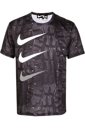 Comme des Garçons Swoosh