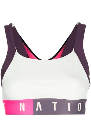P.E Nation Motion logo