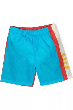 Gucci Shorts - Monogram panelled swim shorts