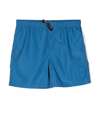 Dolce & Gabbana Shorts - Embossed-logo swim shorts