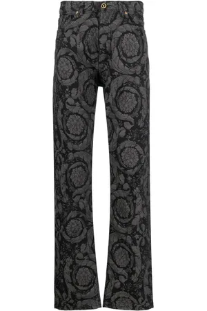 VERSACE Barocco Silhouette patterned jeans
