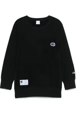 UNDERCOVER X Champion logo