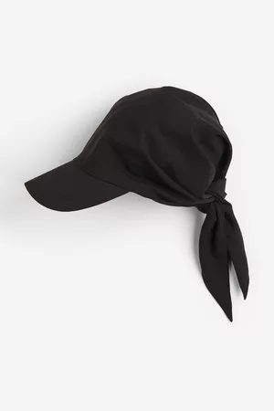 H&M Dames Sportuitrusting - Sportpet met striklintjes - Zwart