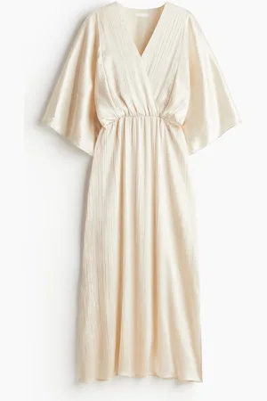 H&M Getailleerde kaftanjurk