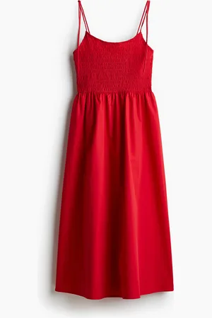 H&M Gesmokte jurk met striklintjes