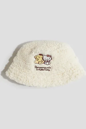 H&M Teddy buckethat met borduursel