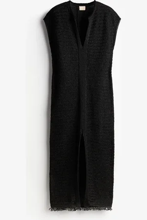 H&M Kaftanjurk met raffialook