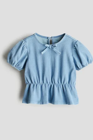 H&M Peplumtop met denimlook