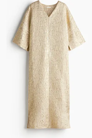 H&M Kaftanjurk van brokaat