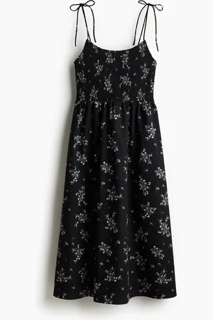 H&M Gesmokte jurk met striklintjes