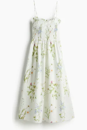 H&M Jurk met smokwerk
