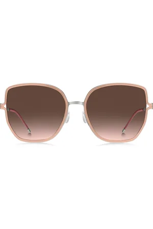 HUGO BOSS Zonnebril met nudekleurig montuur, cut-out poten en merkketting