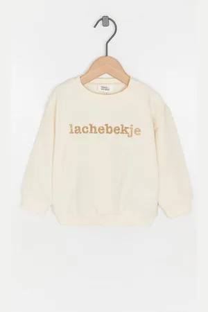 Cuddles and Smiles Blauwe Sweater, Lachebekje
