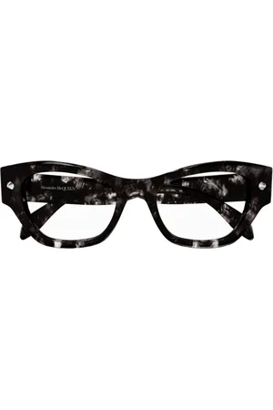 Alexander McQueen Accessoires, unisex, Bruin, ONE Size, Iconische Studs Versierde Cat-Eye Zonnebril