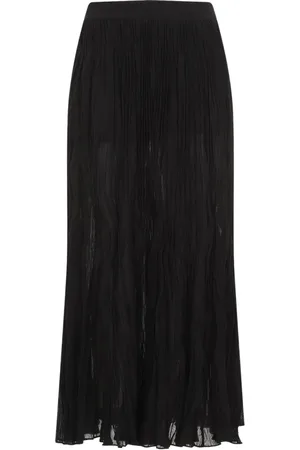 Plooirokken voor dames in de kleur zwart FASHIOLA.be