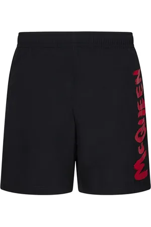 Alexander McQueen Korte broeken, Heren, Zwart, S, Zwart zee kleding met rood graffiti logo