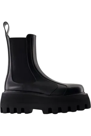 Alexander McQueen Schoenen, Dames, Zwart, 39 EU, Leer, Zwarte Leren Rubberen Laarzen Slip-On
