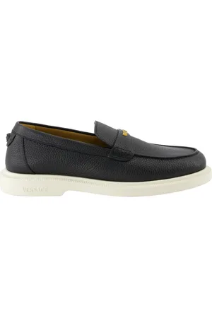 VERSACE Schoenen, Heren, Zwart, 40 EU, Leer, Zwarte korrelige leren loafers Lente-Zomer 2025