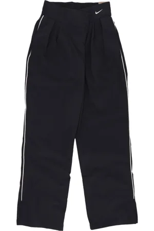 Nike Broeken, Dames, Zwart, S, Nylon, Waterafstotende Asymmetrische Taille Sportieve Broek