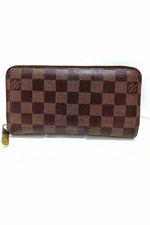 LOUIS VUITTON Pre-owned, Dames, Bruin, ONE Size, Pre-owned Canvas wallets