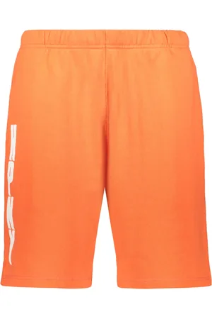 Heron Preston Korte broeken, Heren, Oranje, XL, Katoen, Embossed Logo Katoenen Bermuda Shorts