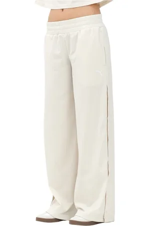PUMA Broeken, Dames, Wit, XS, Witte relaxte broek met lage taille en poppersluiting