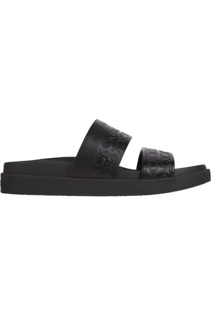 Calvin Klein Schoenen, Dames, Zwart, 36 EU, Leer, Ergo Slide Mono Slippers