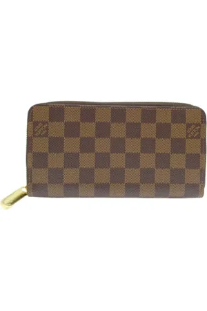 LOUIS VUITTON Pre-owned, Dames, Bruin, ONE Size, Pre-owned Canvas wallets