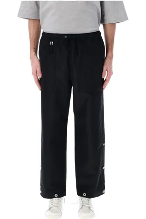 Comme des Garçons Broeken, Heren, Zwart, M, Wol, Zwarte Buttoned Loose Fit Broek