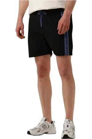 Tommy Hilfiger Korte broeken, Heren, Zwart, 2Xl, Logo Tape Mid Length Slim Zwemshorts